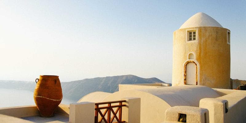 Comparison of generic and brand name medication bottles showing price difference