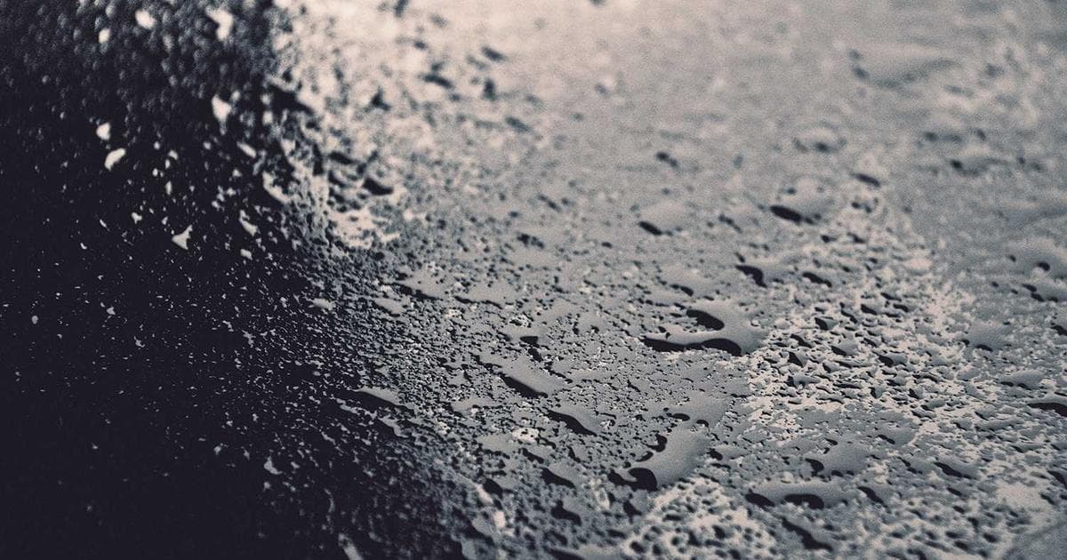 Financial paperwork and laptop showing foreign trust distribution reporting requirements