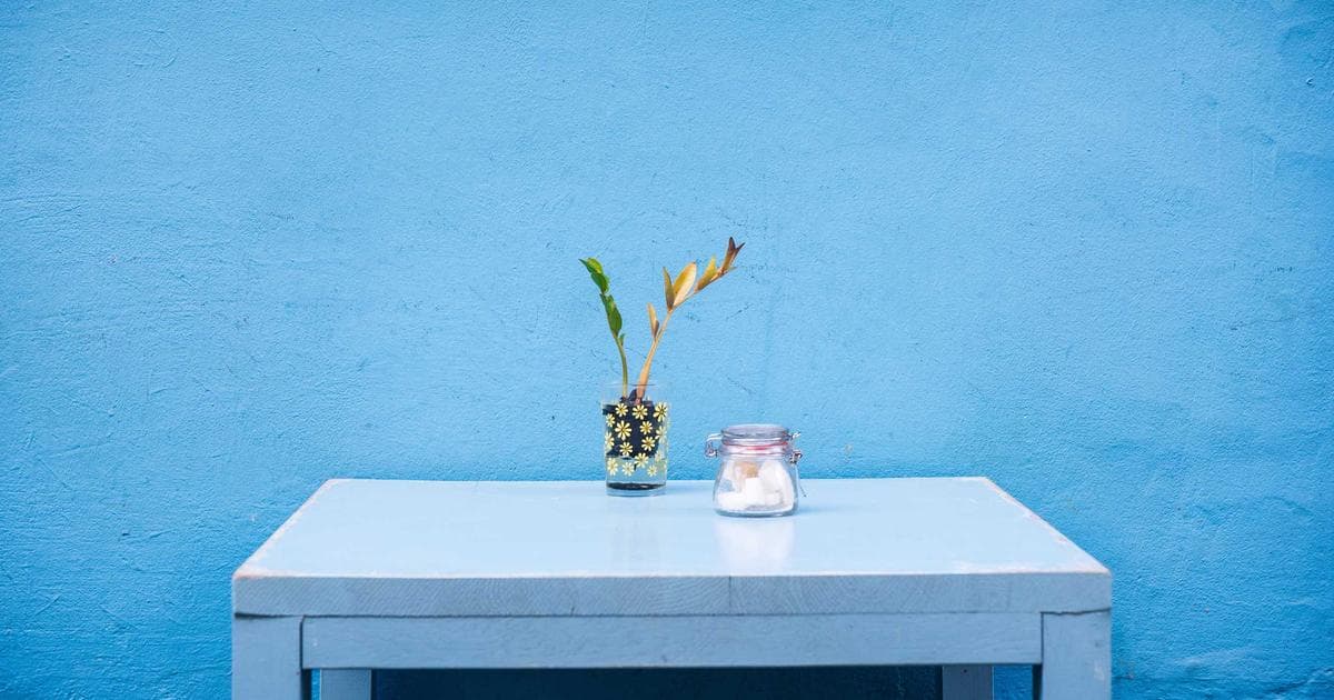 Apartment building exterior with a 'for rent' sign, representing the BC Rental Assistance Program.