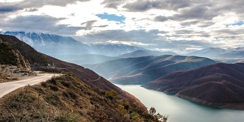 A family relaxing in a cozy living room of a rental apartment
