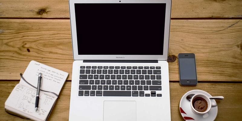 Business desk with financial charts representing trust distribution analysis