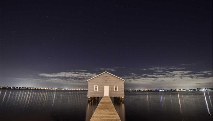 Stethoscope and medical documents on a desk representing healthcare access in Canada