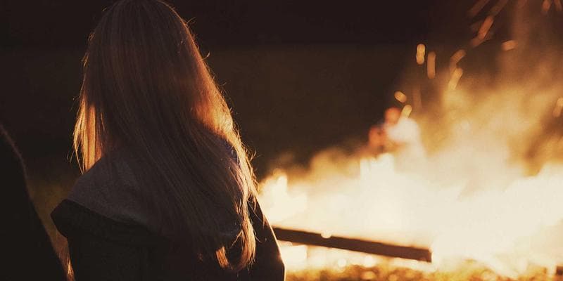 Aerial view of diverse housing options in a Metro Vancouver neighbourhood with mountains in the background