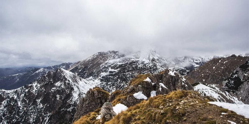 Canadian travel documents and passport on a desk