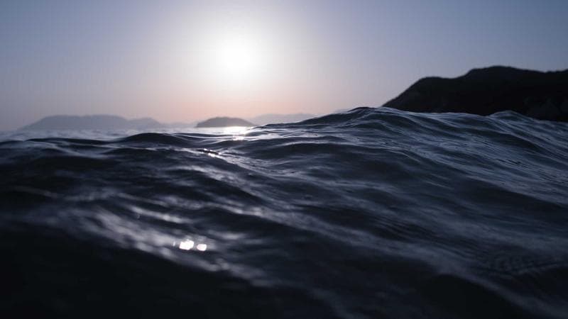 Parliament Hill and the Ottawa River on a clear day showing Canada's capital city where newcomers settle