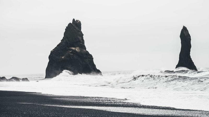 Tax documents, a calculator, and a Canadian flag on a desk