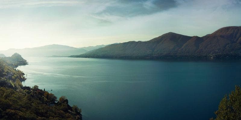 Medical professional reviewing patient documents at a hospital reception desk