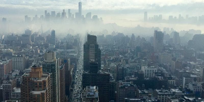 Person signing a statutory declaration in front of a notary public