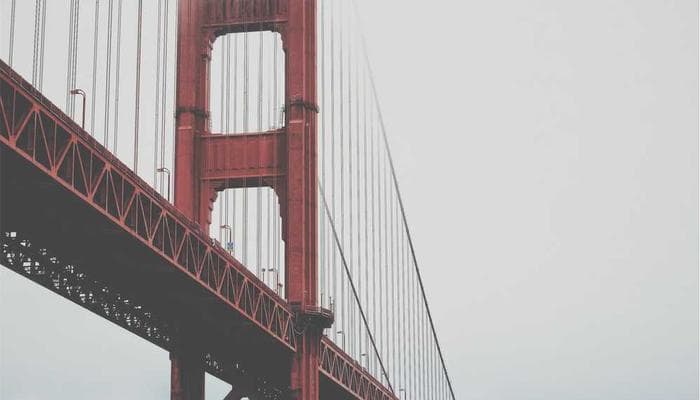 Parent holding a newborn baby representing family life for newcomers in Canada