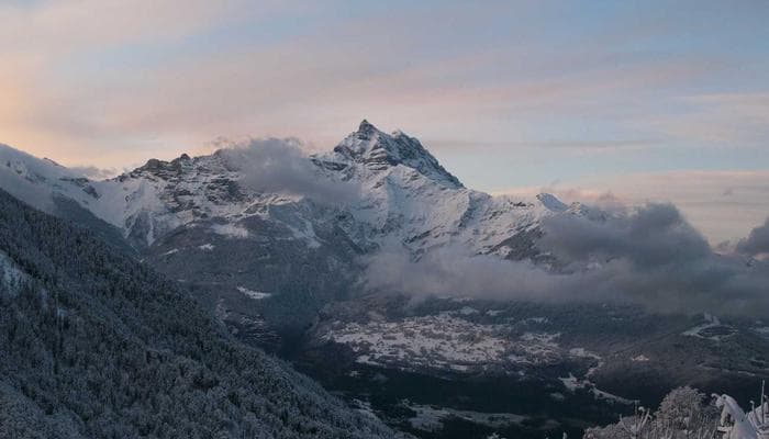 Patient receiving prescription medication from a pharmacist in Canada