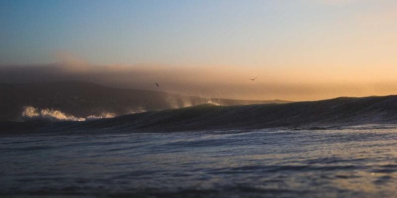 Interior of modern Canadian public library with study spaces and computers