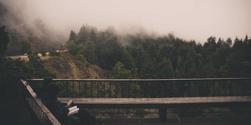 Person calculating foreign income conversion to Canadian dollars for the RC151 form