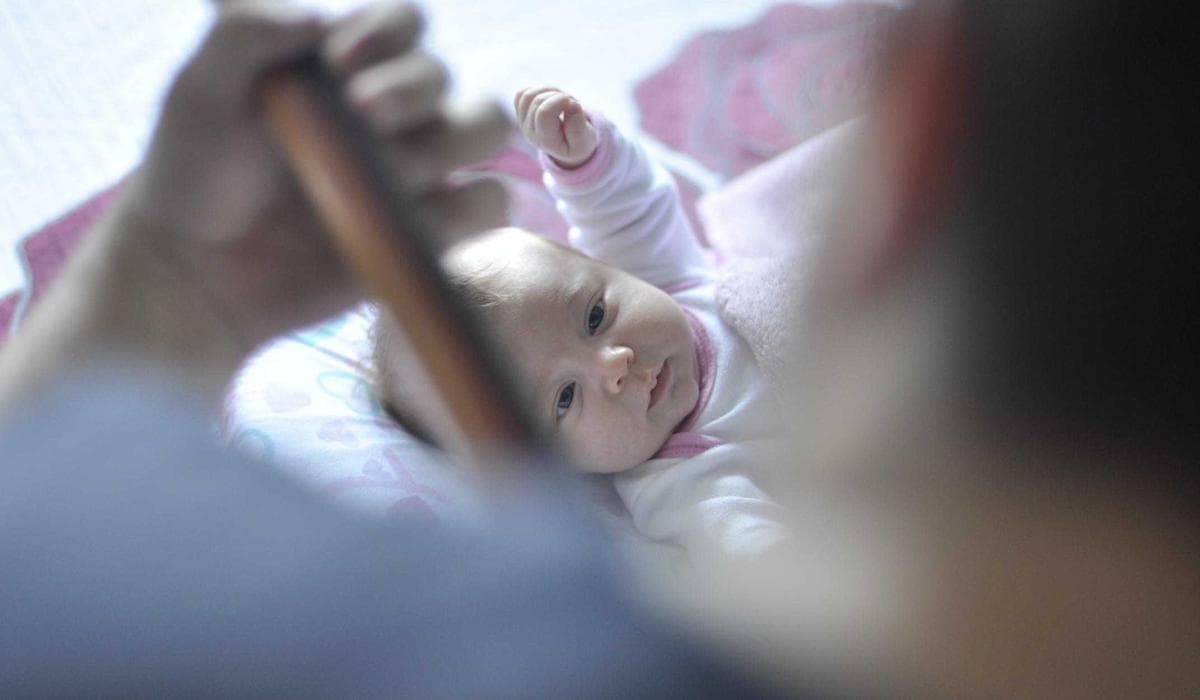 Parent filling out RC66 Canada Child Benefits Application form