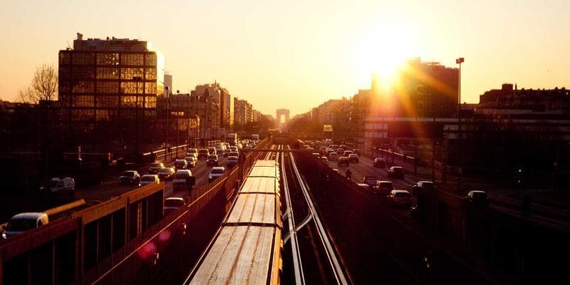 Community gathering in a small Canadian town with diverse residents socializing