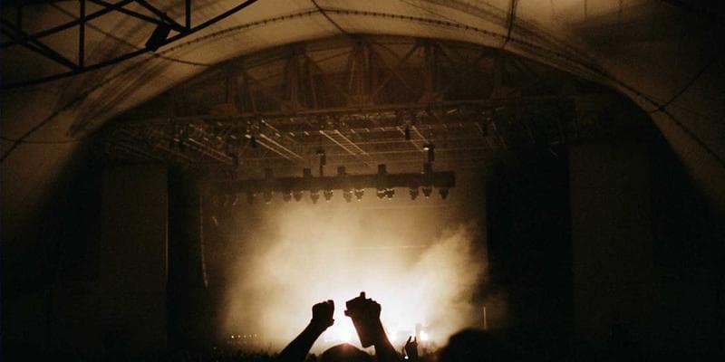 Person looking at Canadian immigration documents, considering a temporary resident permit application