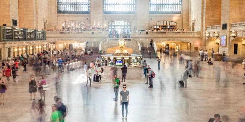 Organized stack of documents for a Canadian visitor visa application checklist