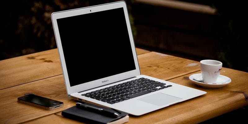 A doctor consulting with a patient in a modern clinic setting in Canada, illustrating primary care.