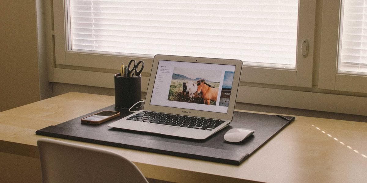 Entrepreneur packing orders for an online store in a home office workspace
